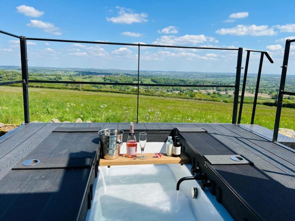 Outdoor bath with stunning views at The Cabin, Peak District