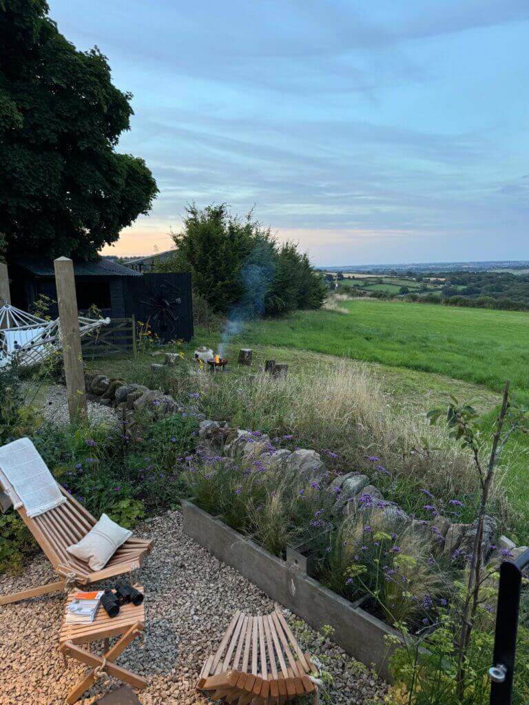 Fire pit, hammock and seating area at The Cabin, Matlock